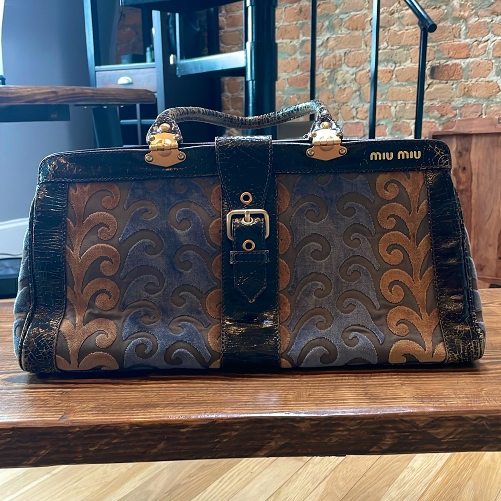 Vintage Miu Miu cracked leather carpet bag - collectors item.
